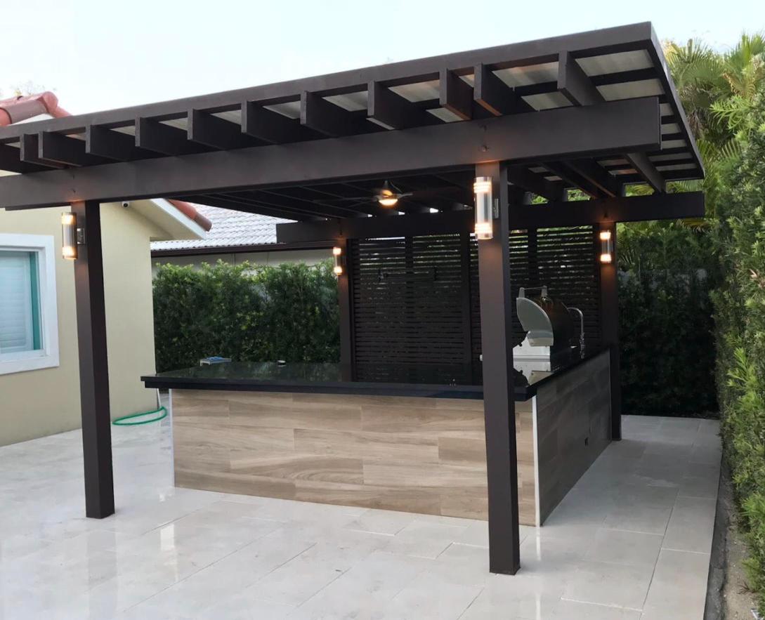Outdoor kitchen under pergola