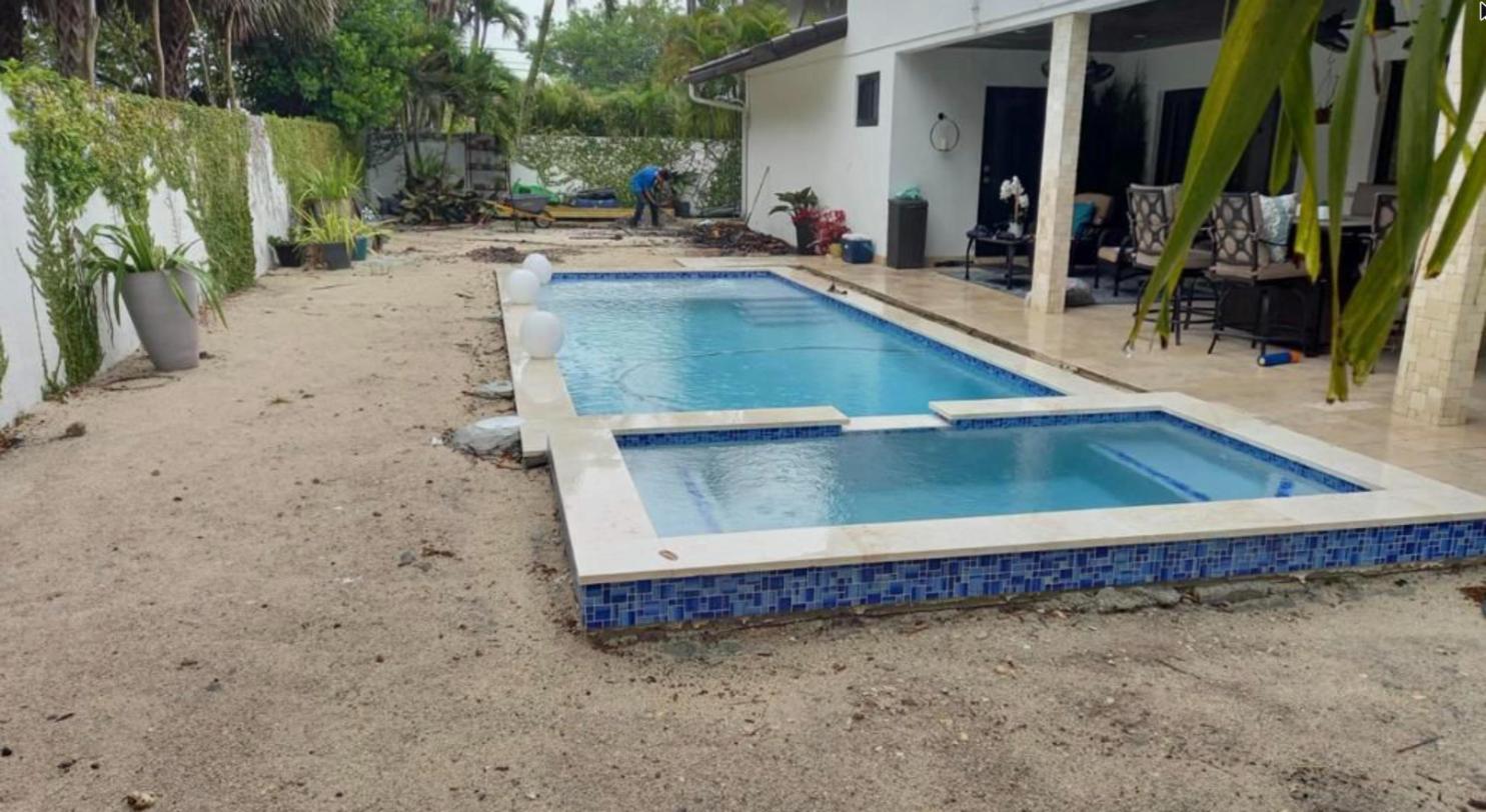 Pool under construction before pavers and turf