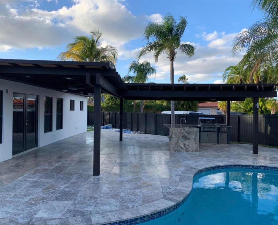 Pergola, outdoor kitchen and pool deck